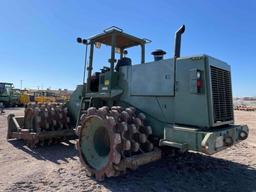 2000 Caterpillar 815F Padfoot Compactor