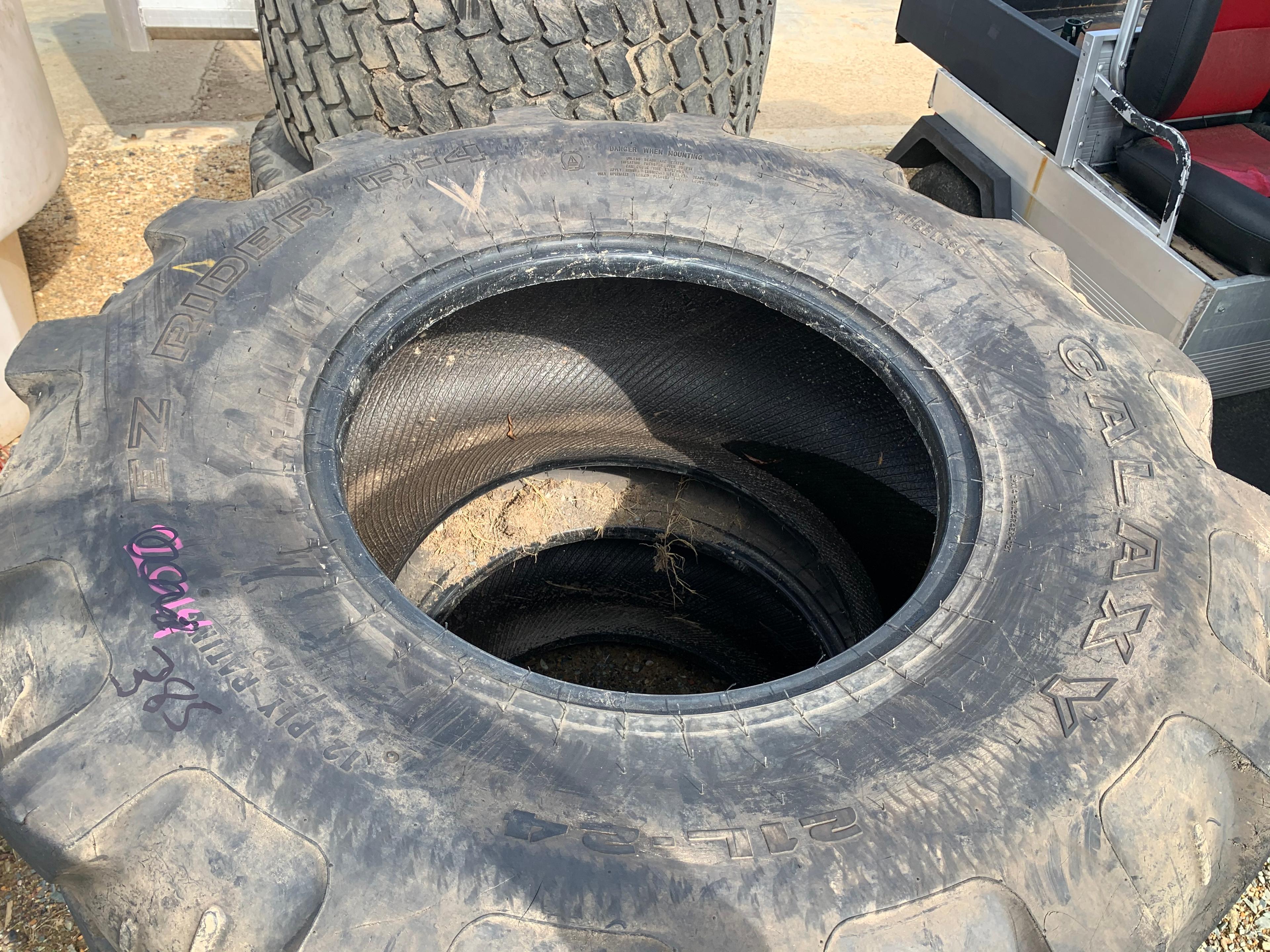 set of (2) 21L-24 Tires