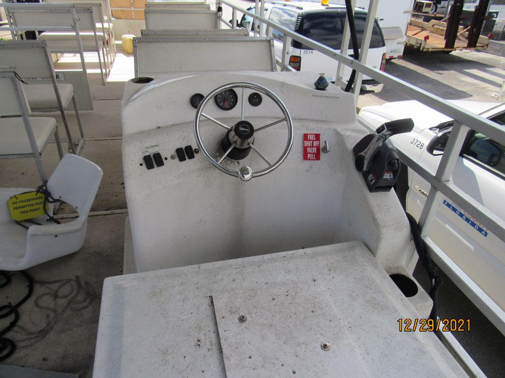 Pontoon Boat with Evinrude Outboard Motor