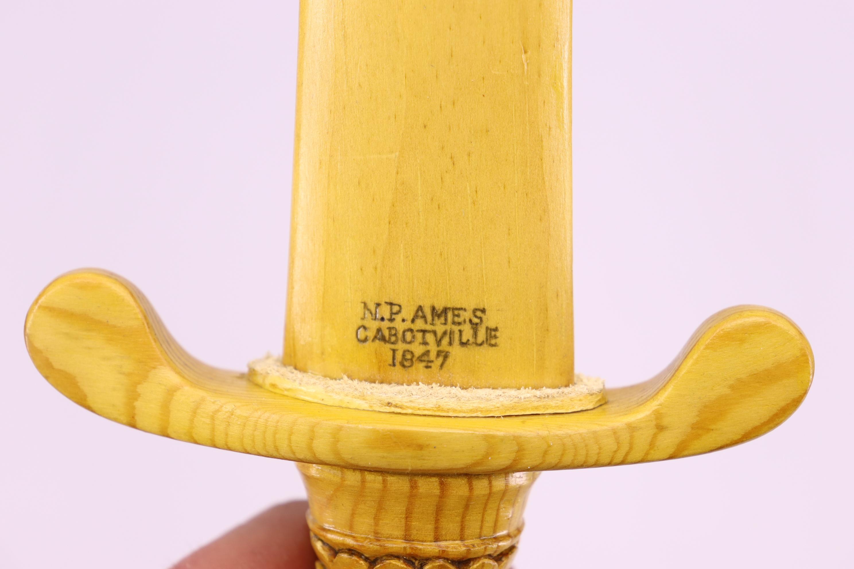 N.P. Ames Cabotville 1847 Wood Carved Sword – Overall Length is 26 ¾”.