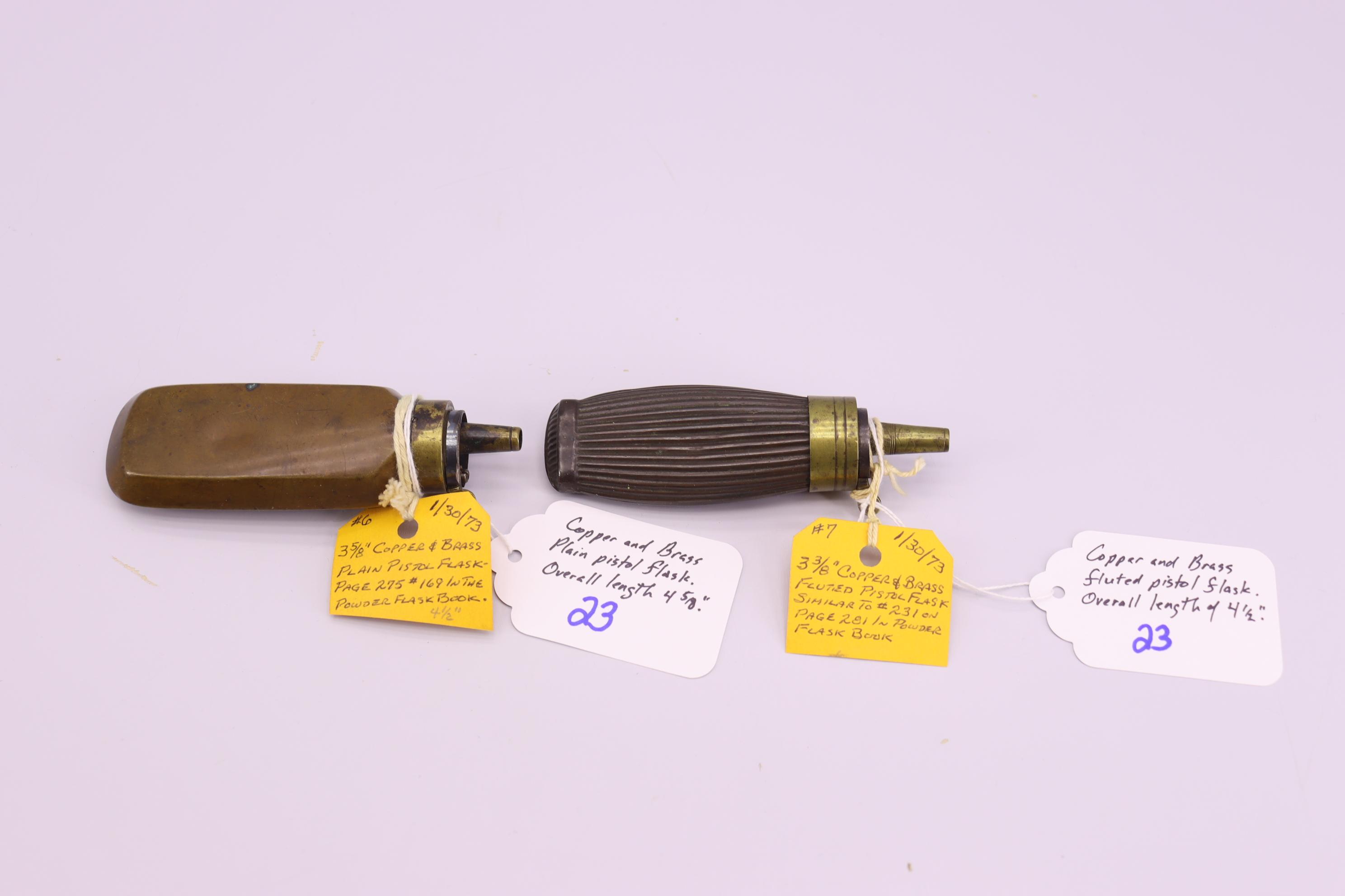 Pair of Powder Flasks – 1st Copper and Brass Fluted Pistol Flask, Overall Length is 4 ½” – 2nd Coppe