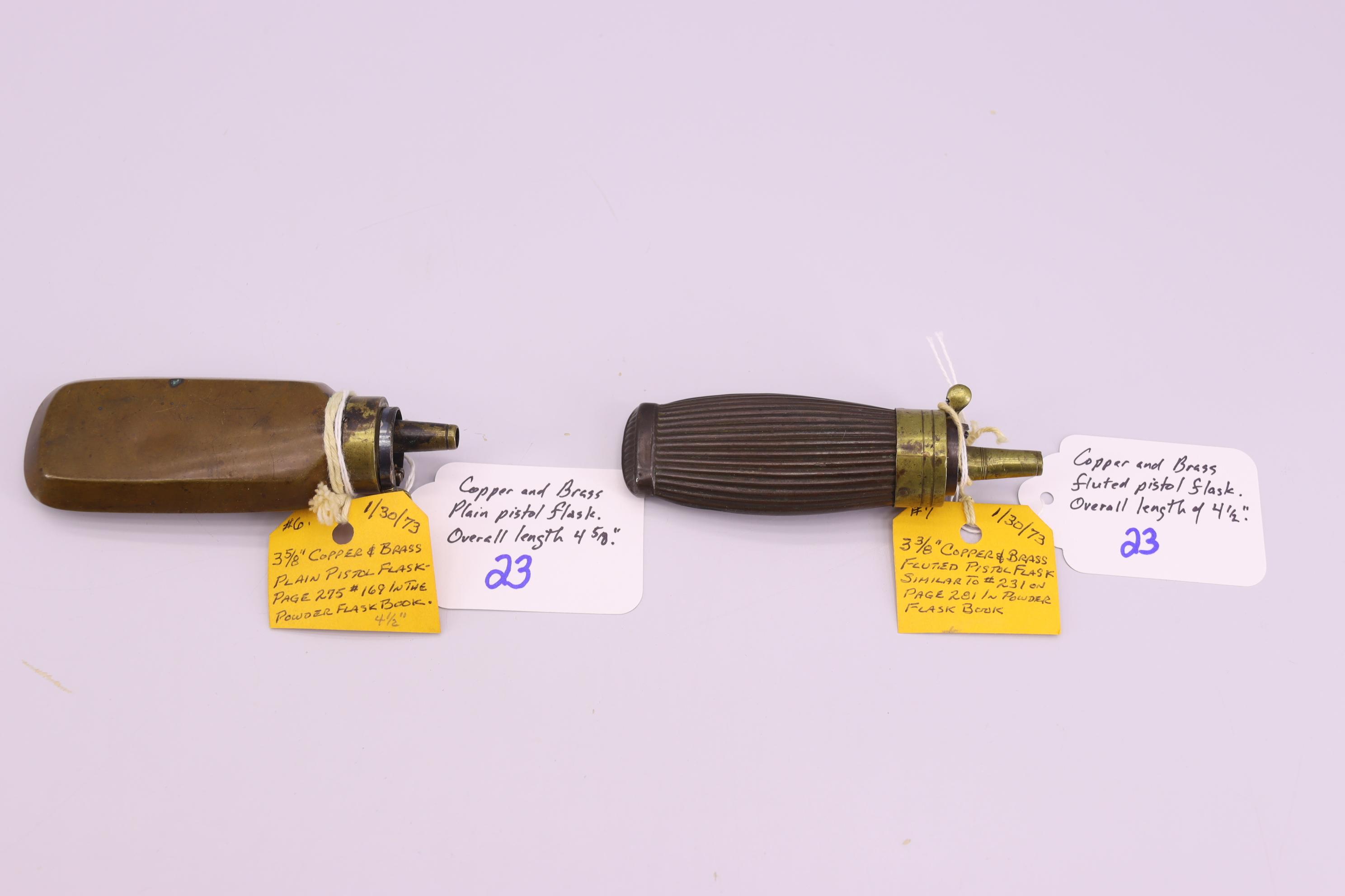 Pair of Powder Flasks – 1st Copper and Brass Fluted Pistol Flask, Overall Length is 4 ½” – 2nd Coppe