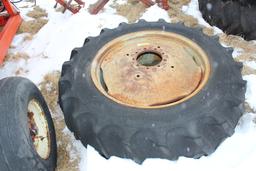 16.9-34 TRACTOR TIRE ON 9 BOLT RIM