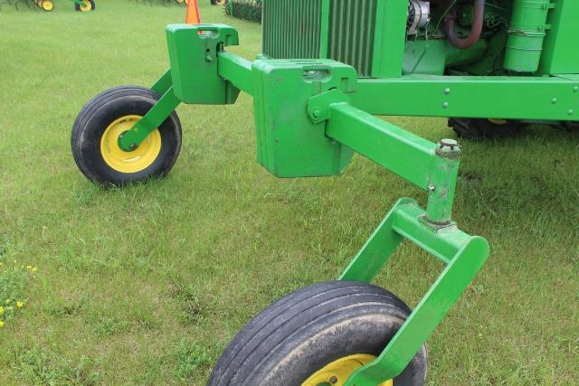 JOHN DEERE 2320 SWATHER, (6) SUITCASE WEIGHTS,