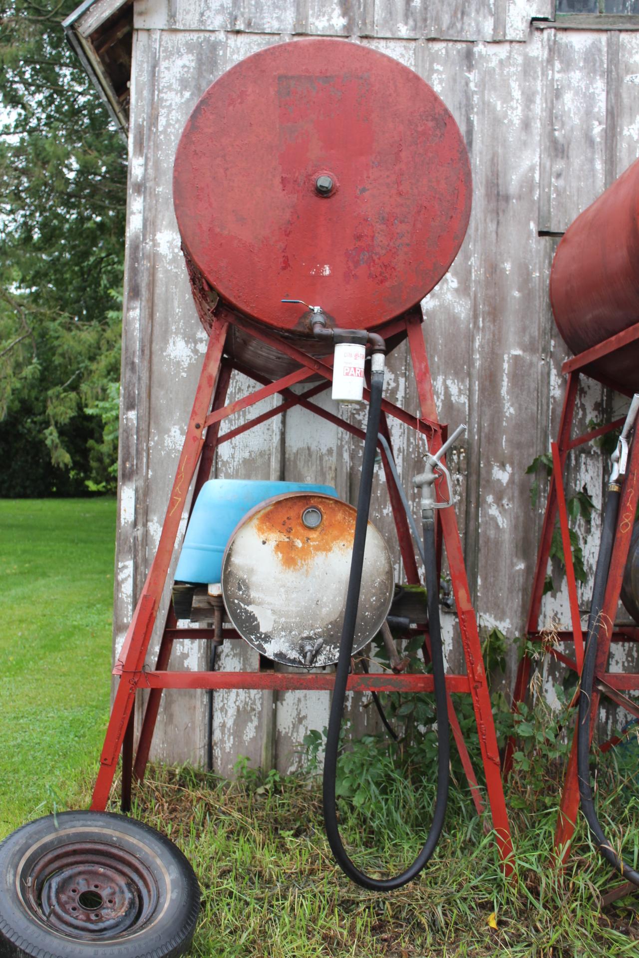 300 GALLON GRAVITY FUEL BARREL ON STAND