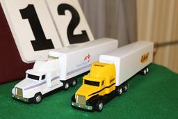 (2) 1/64 FREIGHTLINER SEMIS WITH TRAILERS,