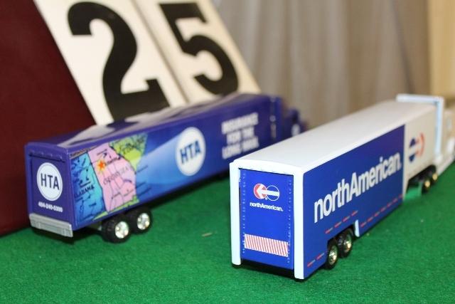 (2) 1/64 FREIGHTLINER SEMIS WITH TRAILERS,