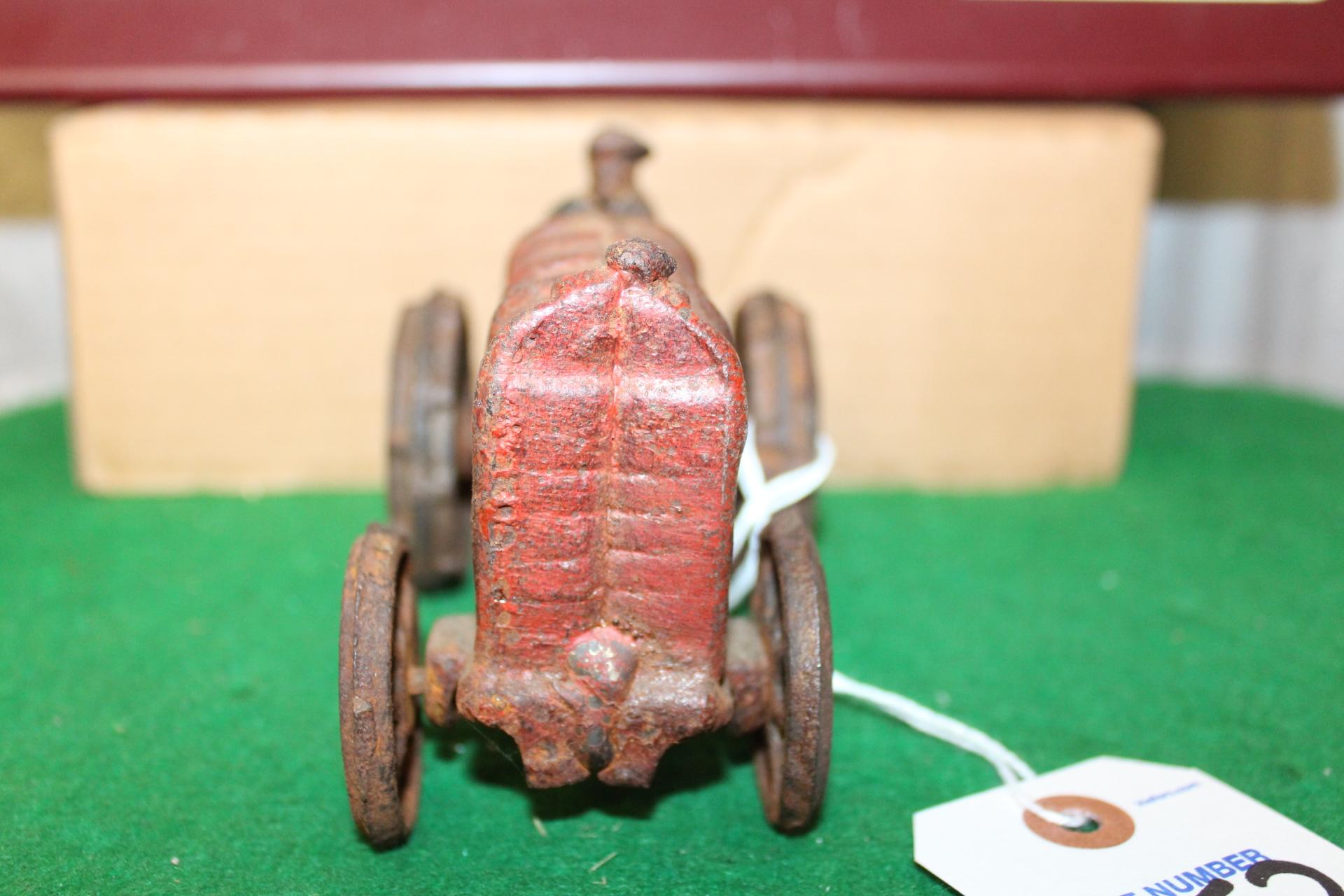 CAST IRON FORD TRACTOR WITH MAN, NO BOX