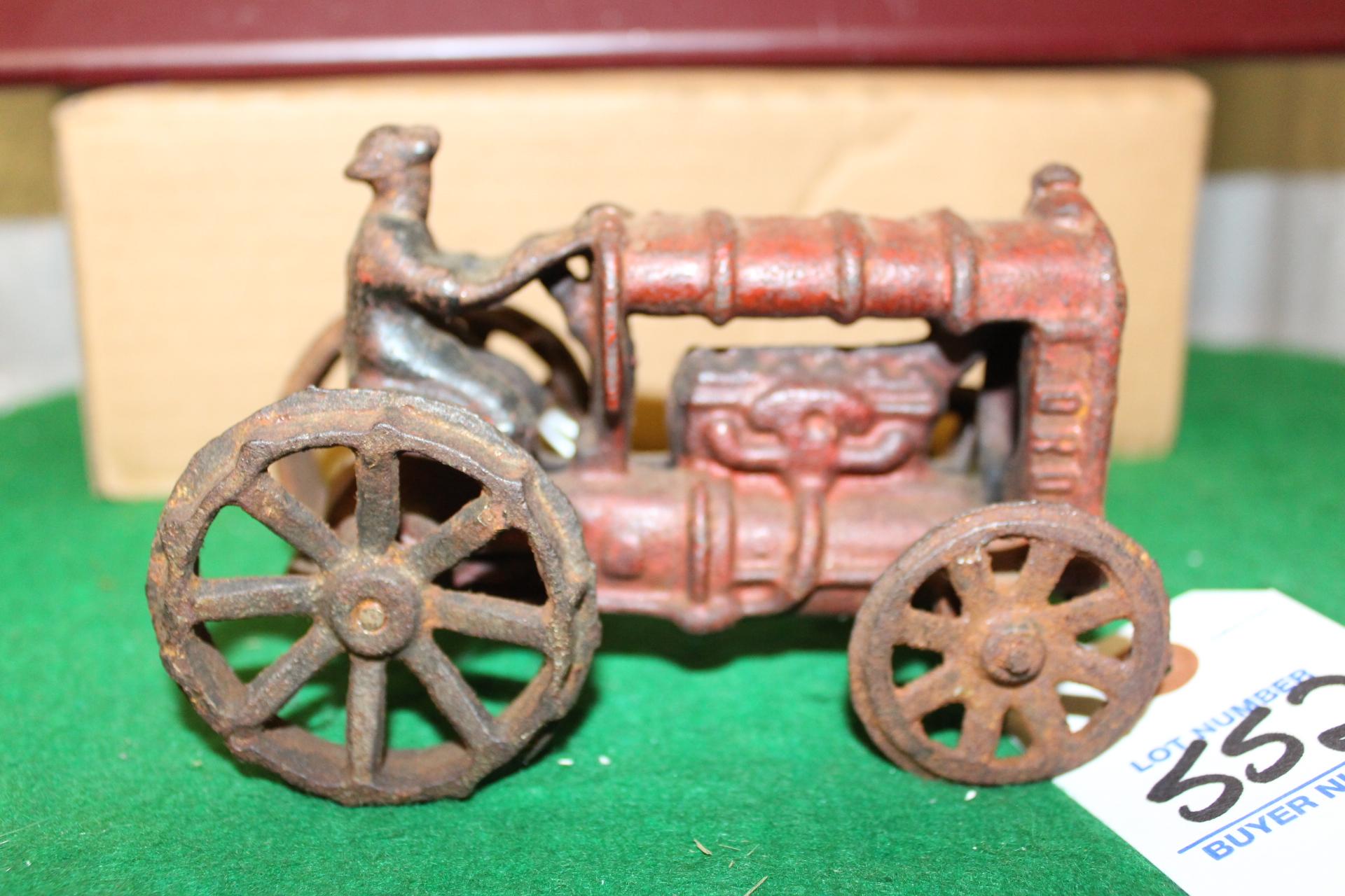 CAST IRON FORD TRACTOR WITH MAN, NO BOX