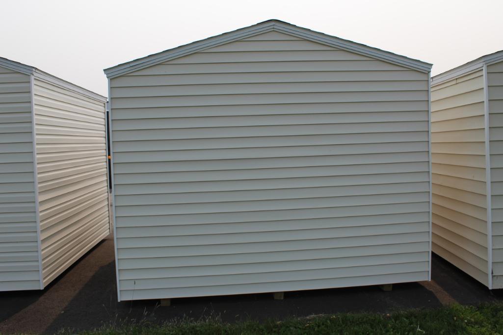 NEW 10' X 12' SHED ON SKIDS, 6' X 6' ROLL UP DOOR, LIGHT TAN, TAX