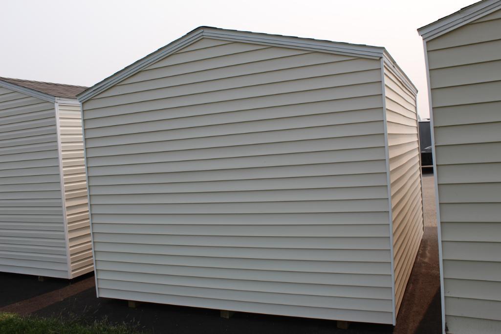 NEW 10' X 12' SHED ON SKIDS, 6' X 6' ROLL UP DOOR, LIGHT TAN, TAX