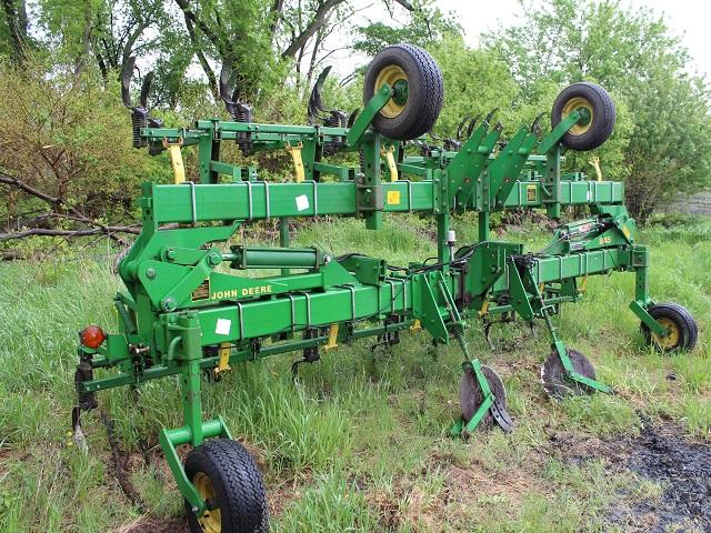 JD 845 30’ Flat Fold Cult Bar with 3 Bar Shank setup, used as field cult, 2