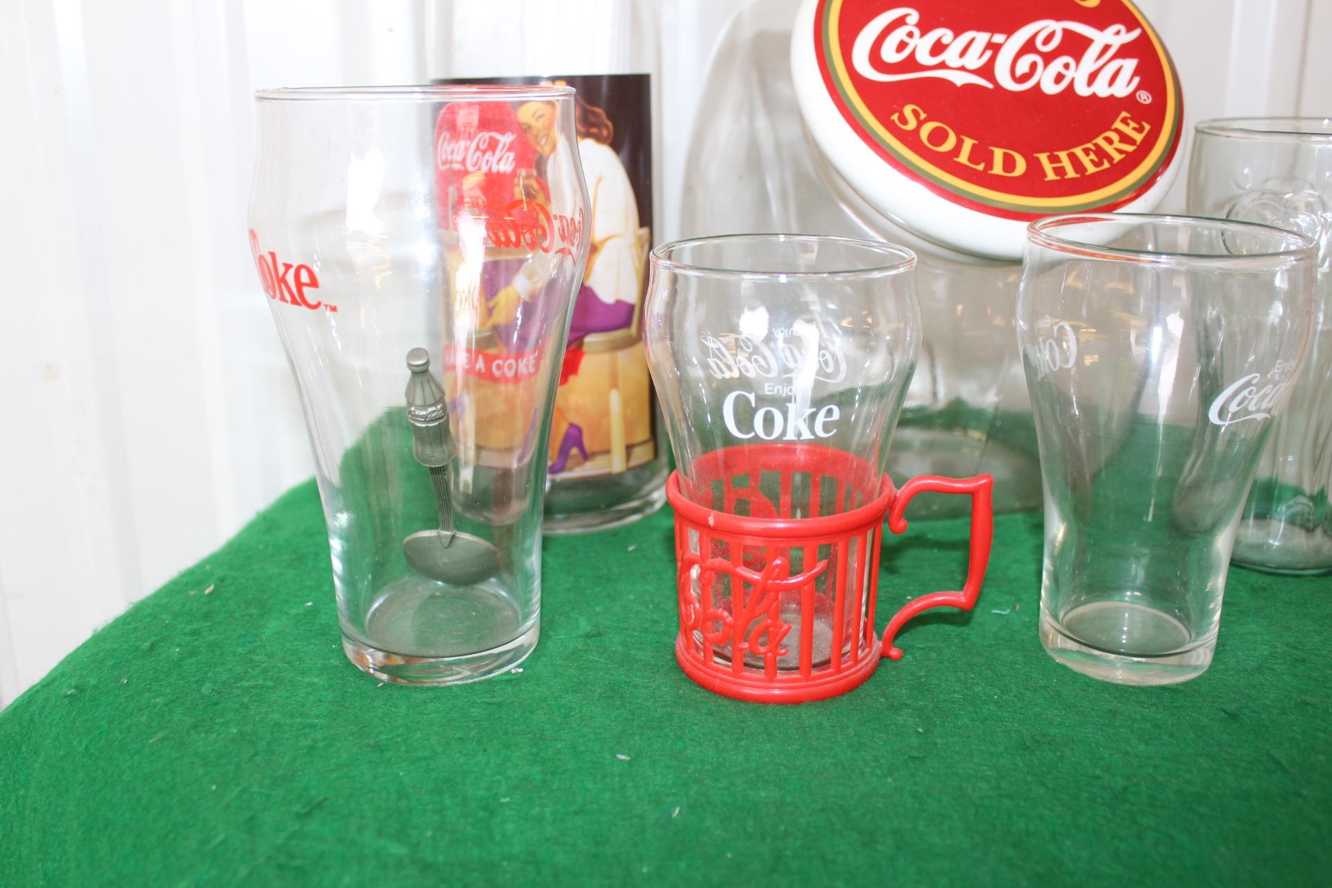 Coca Cola glasses various sizes, straw holder with straws, glass jar with c