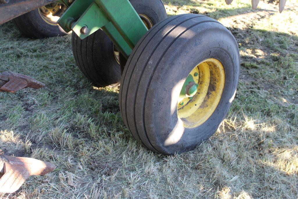 John Deere 512 Disk Ripper, (9) Shank, 11" Points, Shin Guards, (2) Front Gauge Wheels,