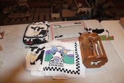 Cow cutting board, hand towels and wood basket