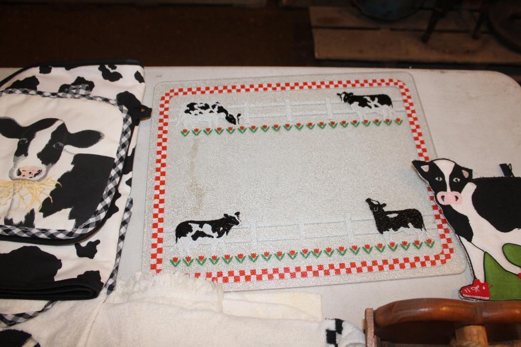 Cow cutting board, hand towels and wood basket