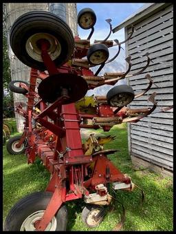 IH 133 12R30" Cultivator, Rolling Shields, Wing Fold, wings lift slightly when in operation