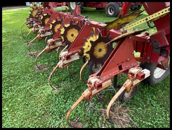 IH 133 12R30" Cultivator, Rolling Shields, Wing Fold, wings lift slightly when in operation