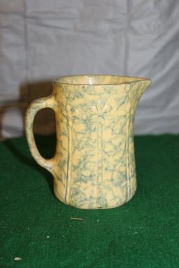 APPROX. 4" SPONGEWARE CREAMER AND STONEWARE CUP, HAS CHIPS AND CRACKS