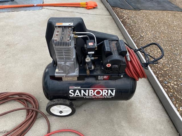 SANDBORN 20 GALLON PORTABLE AIR COMPRESSOR, 110 VOLT, (3) AIR HOSES, COVER