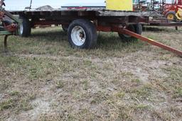 8'X16' FLAT BED WITH HUSKEE 4 WHEEL RUNNING GEAR, 15" FLOATATION TIRES, DECK NEEDS SOME REPAIR