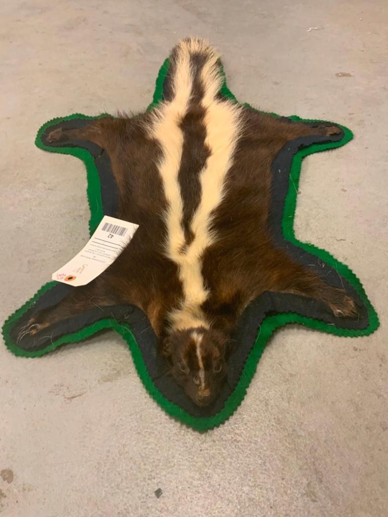 FELTED SKUNK RUG