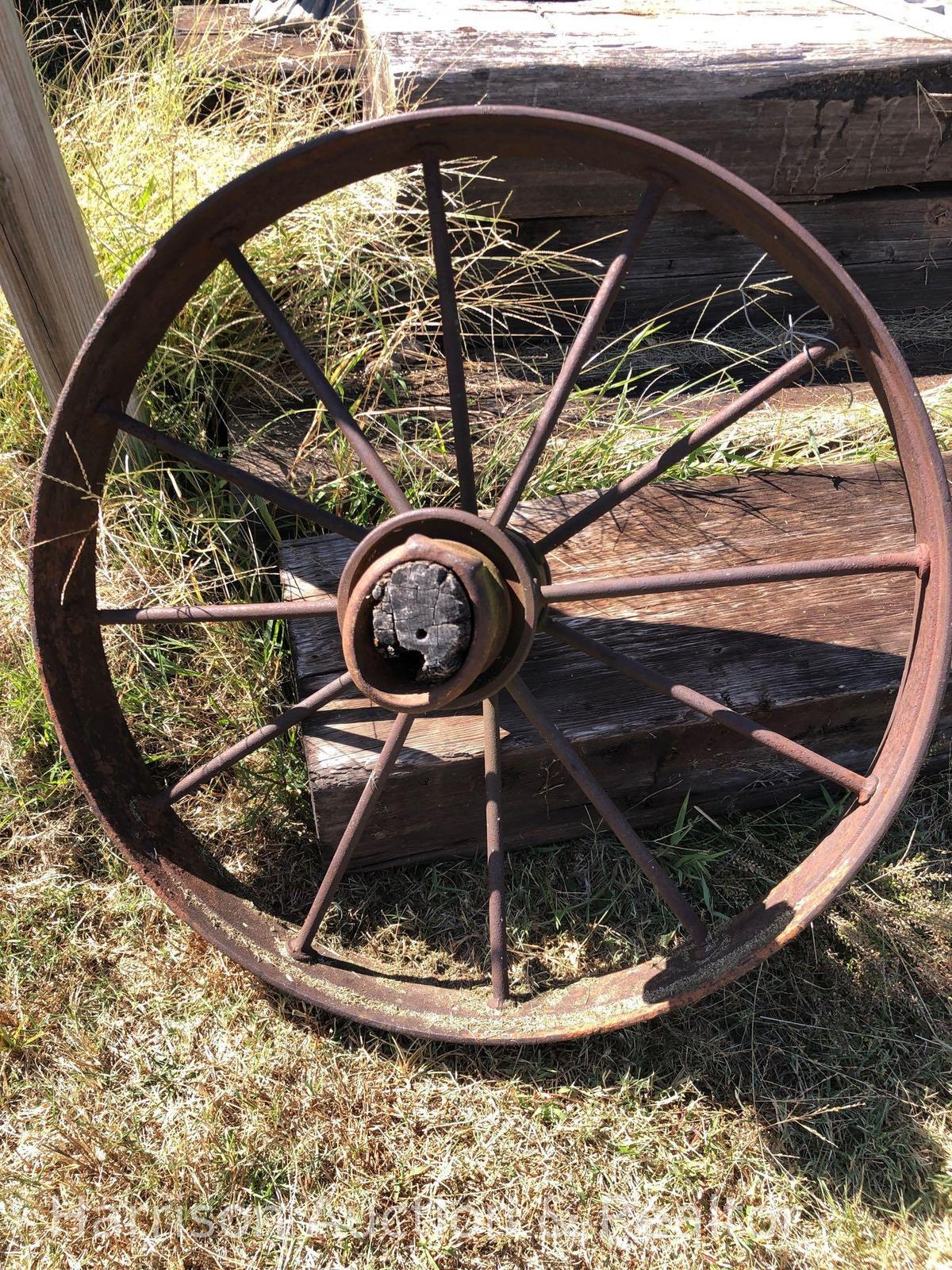 Antique metal wagon wheel