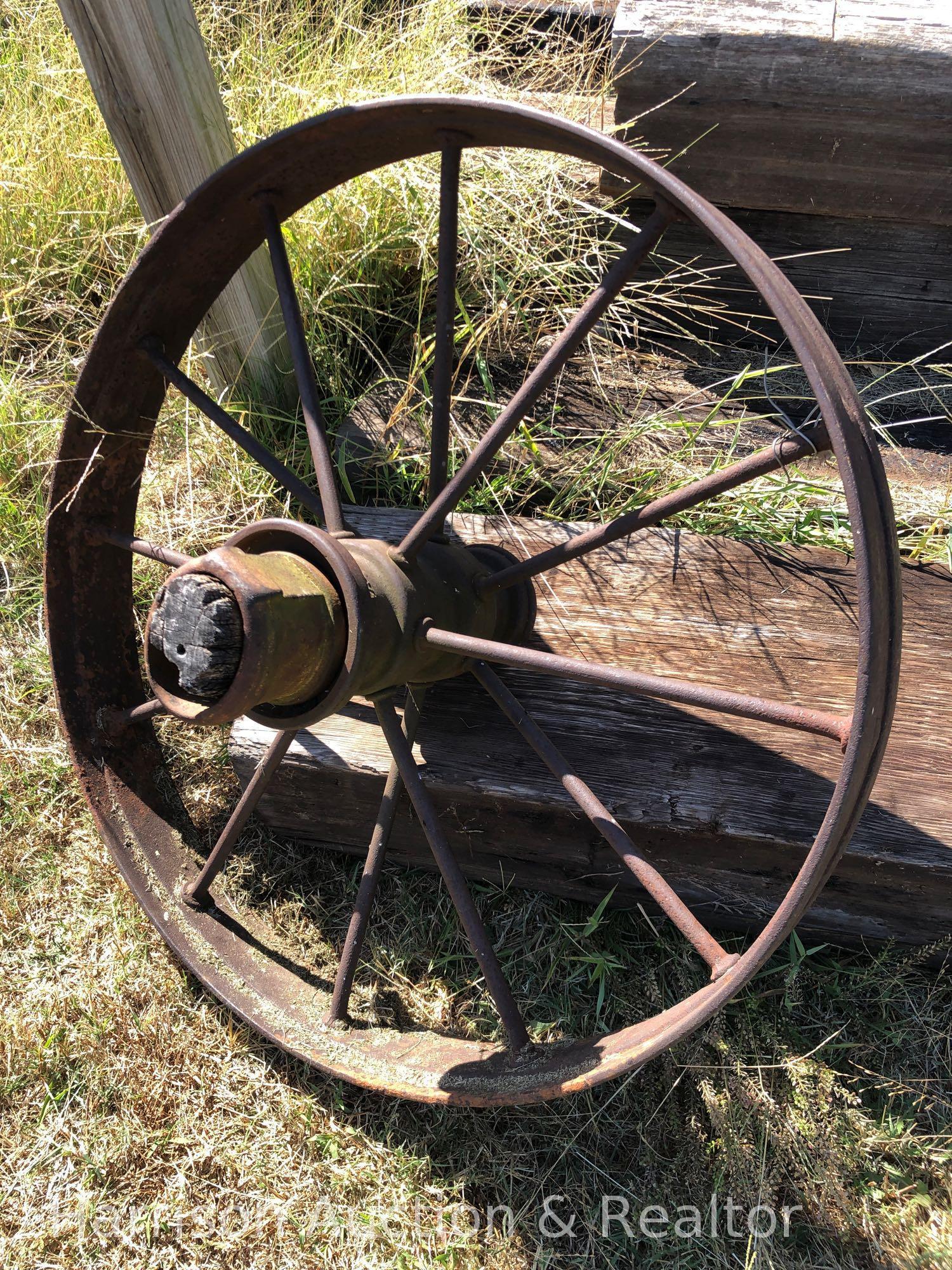 Antique metal wagon wheel