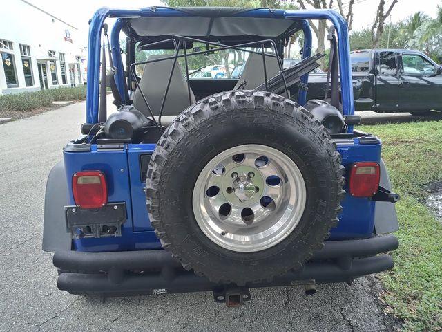 1994 Jeep Wrangler. 2.5L 4 cyl engine. 5 speed manual transmission. 2 tops-