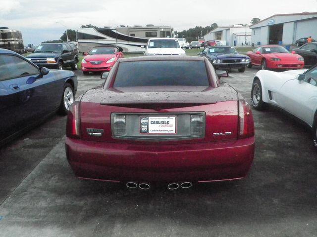 2006 Red Cadillac XLR Roadster.This beautiful Burgundy Metallic Convertible