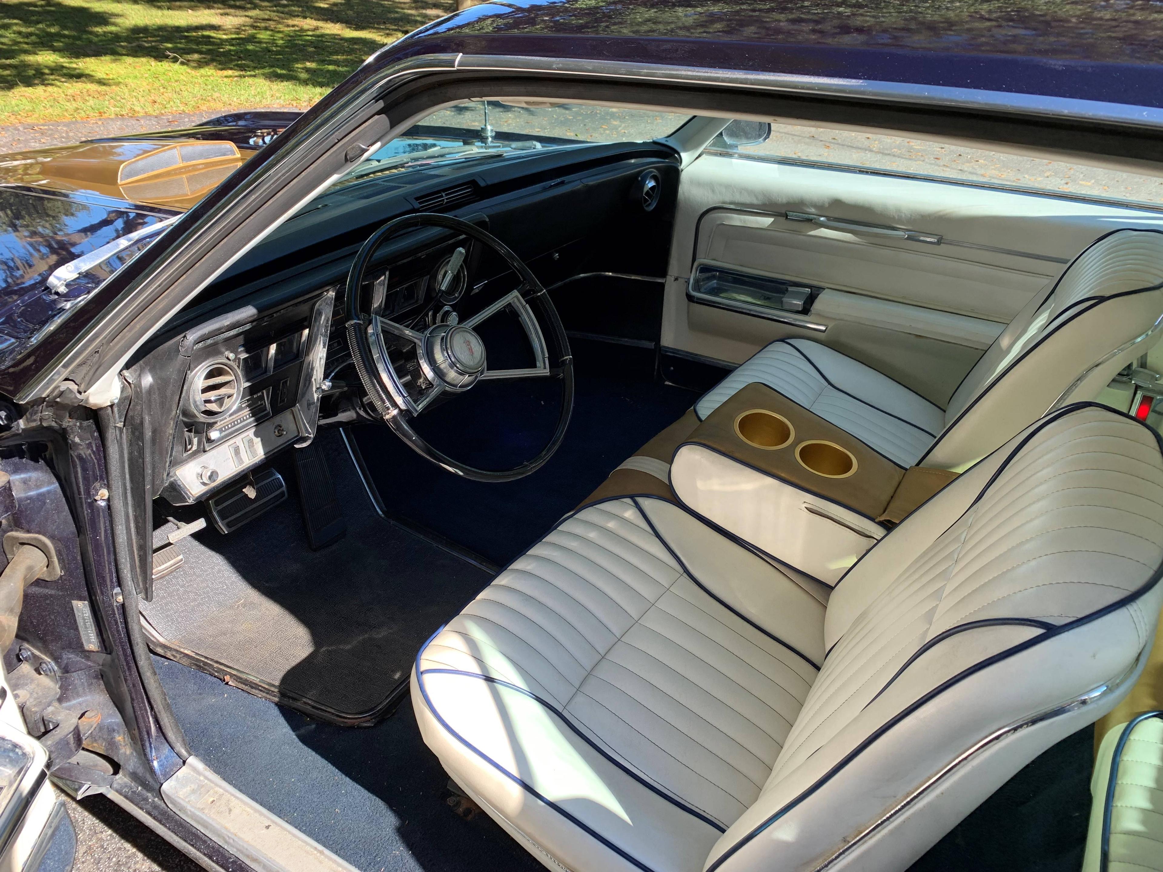 1966 Oldsmobile Toronado Coupe. Older restoration done to the theme of a Hu