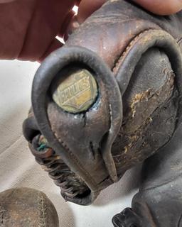 Pair of Vintage Baseball Mitts and a Ball