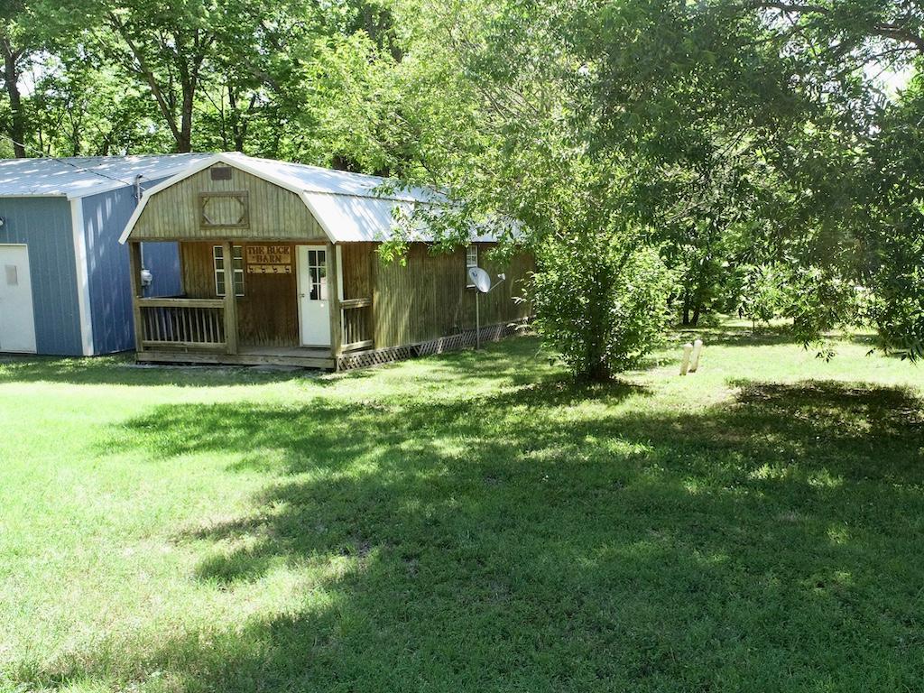 TRACT 1 of 2  Home, Shop, and Extra Cabin on 2.5+/- Acres.