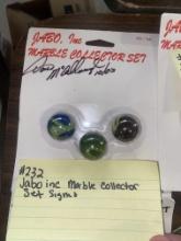 Jabo Inc marble collector set signed