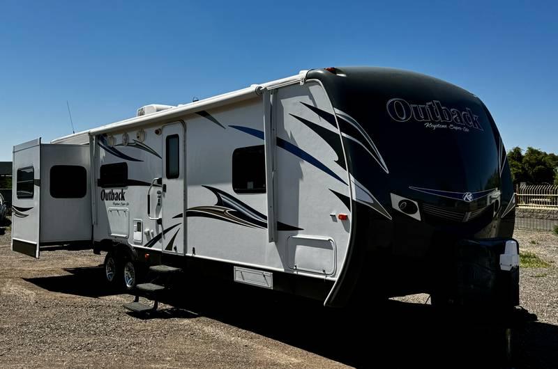 2013 Keystone Outback Super-Lite 298RE Travel Trailer with Three Slide Outs