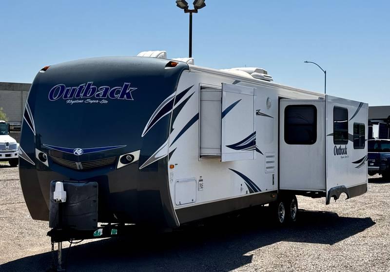 2013 Keystone Outback Super-Lite 298RE Travel Trailer with Three Slide Outs