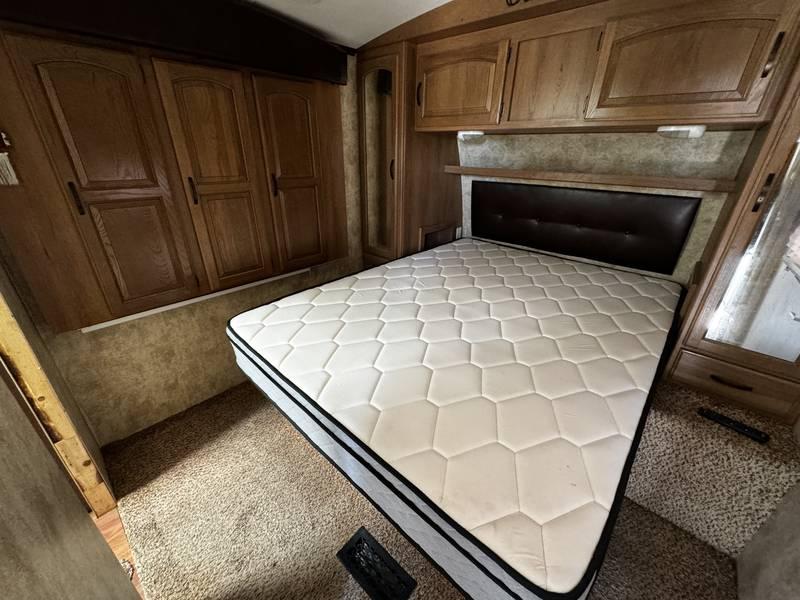 2013 Keystone Outback Super-Lite 298RE Travel Trailer with Three Slide Outs