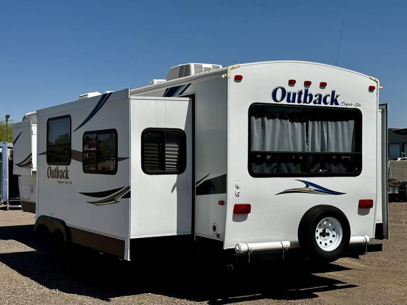 2013 Keystone Outback Super-Lite 298RE Travel Trailer with Three Slide Outs