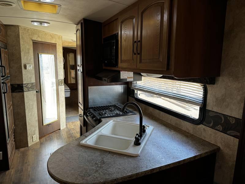 2013 Keystone Outback Super-Lite 298RE Travel Trailer with Three Slide Outs