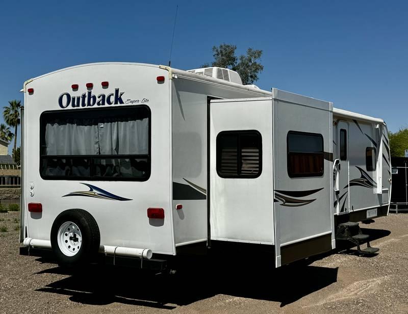 2013 Keystone Outback Super-Lite 298RE Travel Trailer with Three Slide Outs