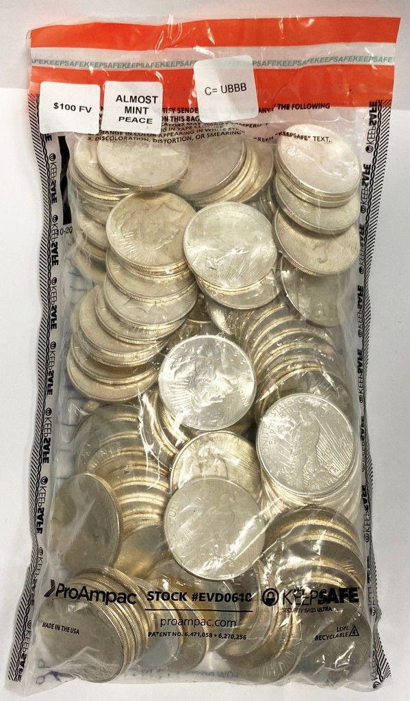 (100) Almost Mint Peace Silver Dollars