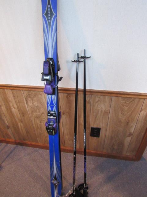 Purple Blue Skis With Matching Poles