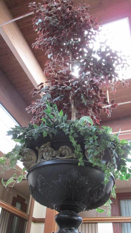 Pair Of Large Metal Urns With Artificial Ficus