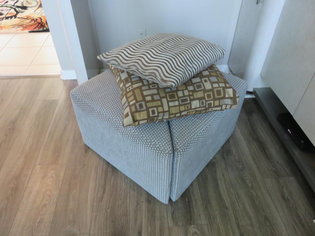 Pair Of Triangular Ottomans With Pillows