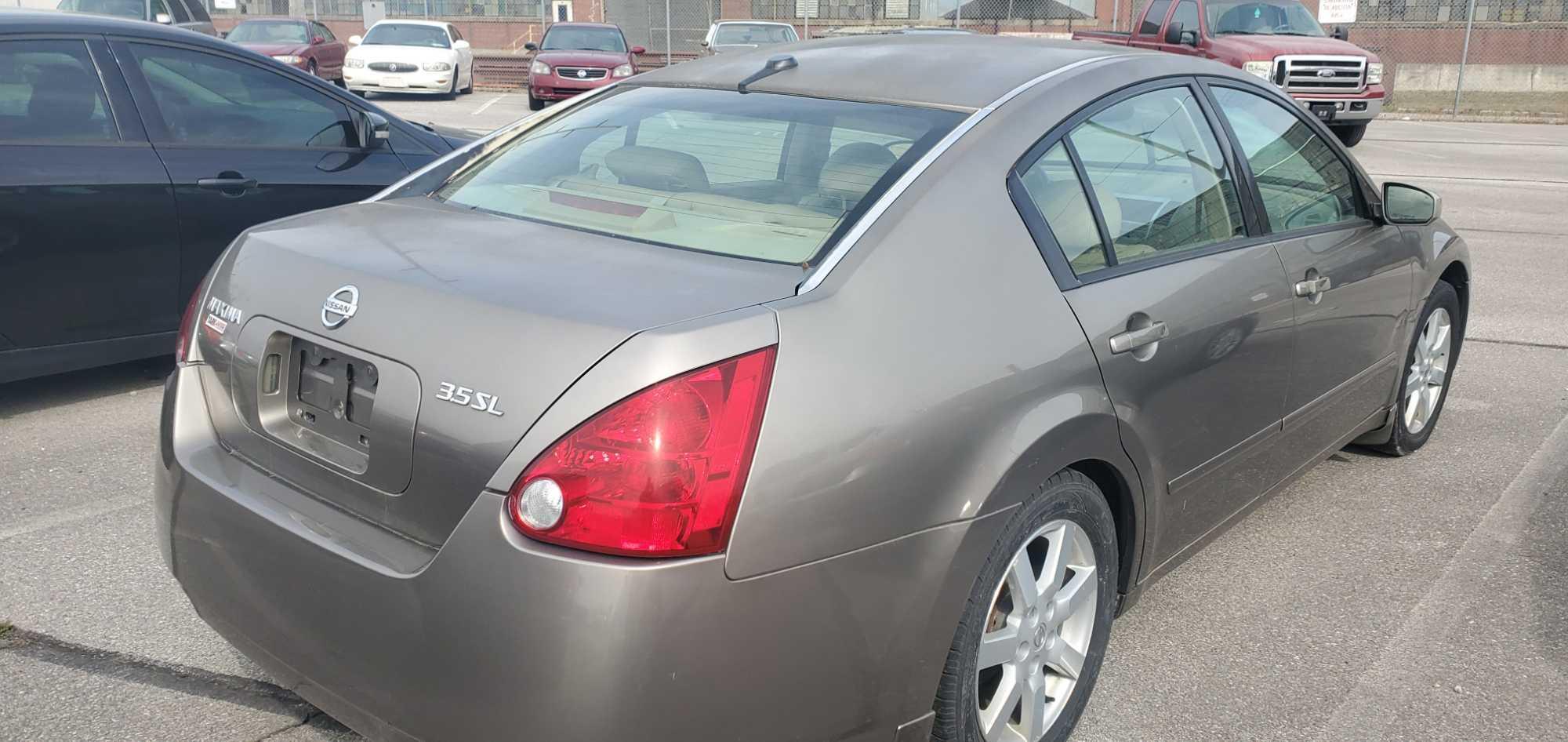 2005 Gold Nissan Maxima