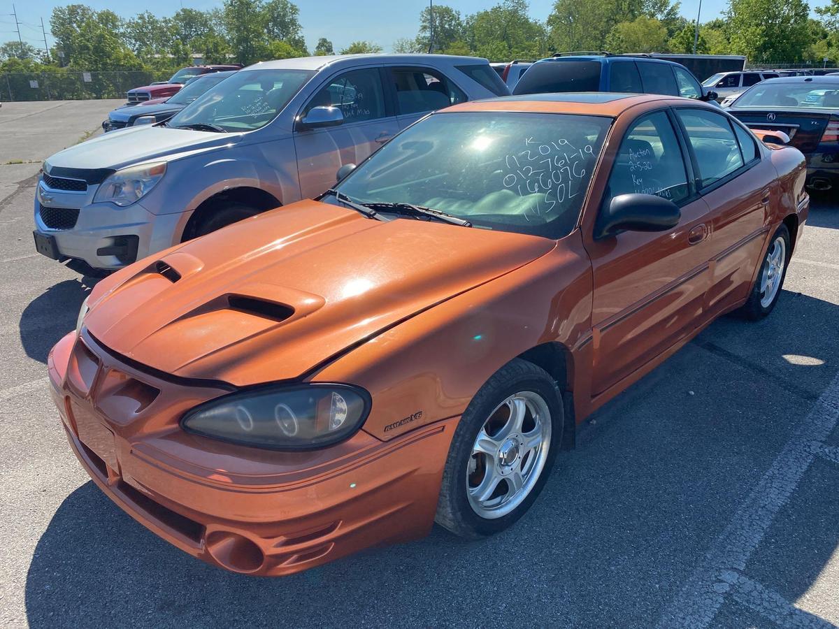 2004 Orange Pontiac Grand Am GT