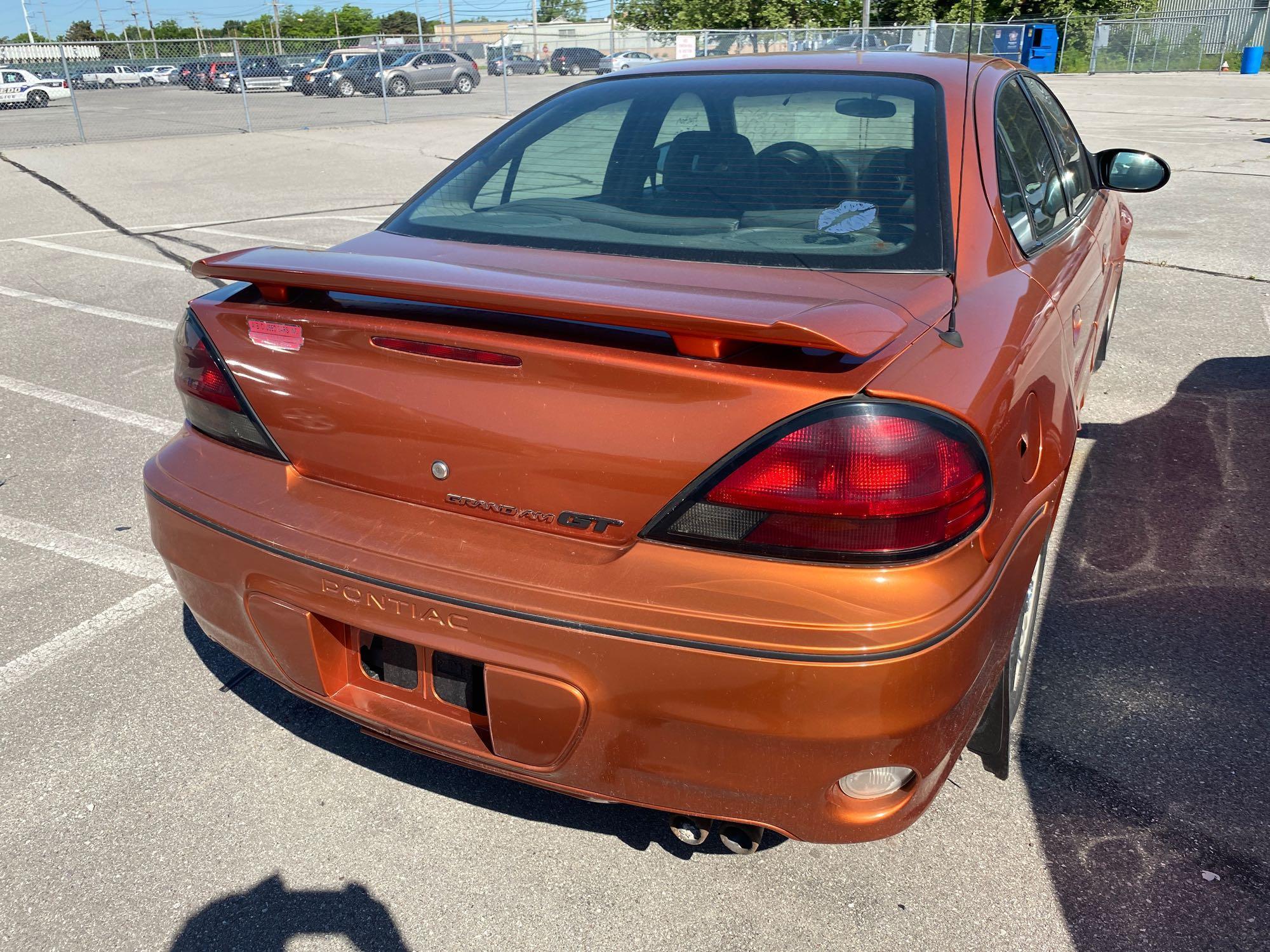 2004 Orange Pontiac Grand Am GT