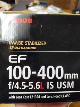 B- Canon EF 100-400mm