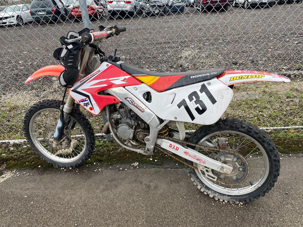 1999 Red Honda CR125R Motorcycle