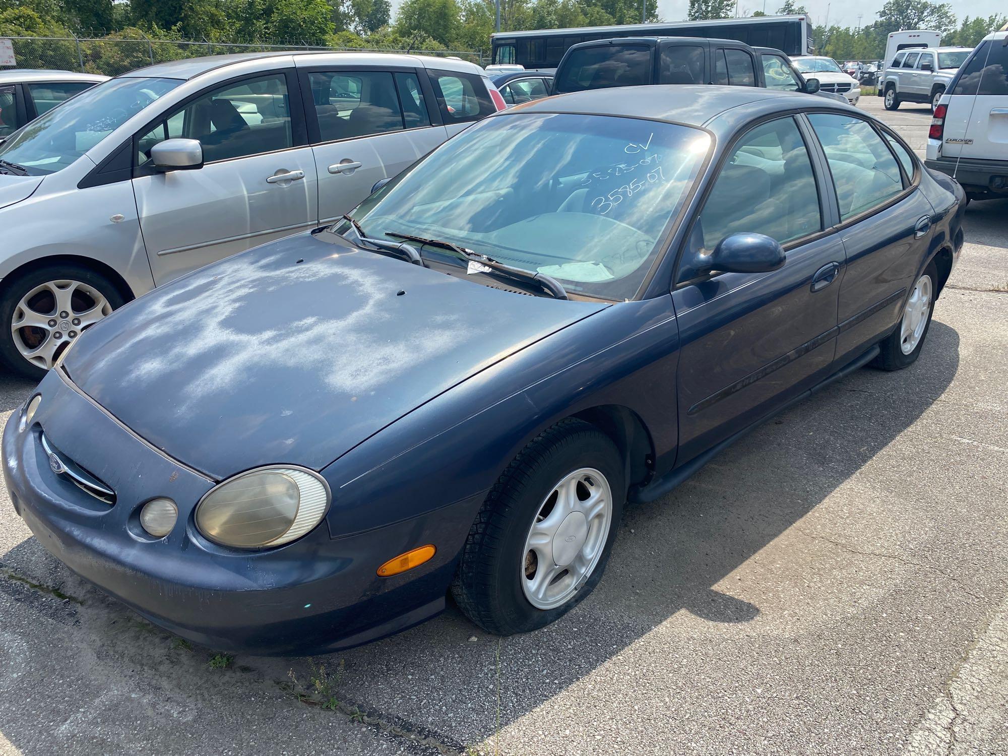 1998 Blue Ford Taurus